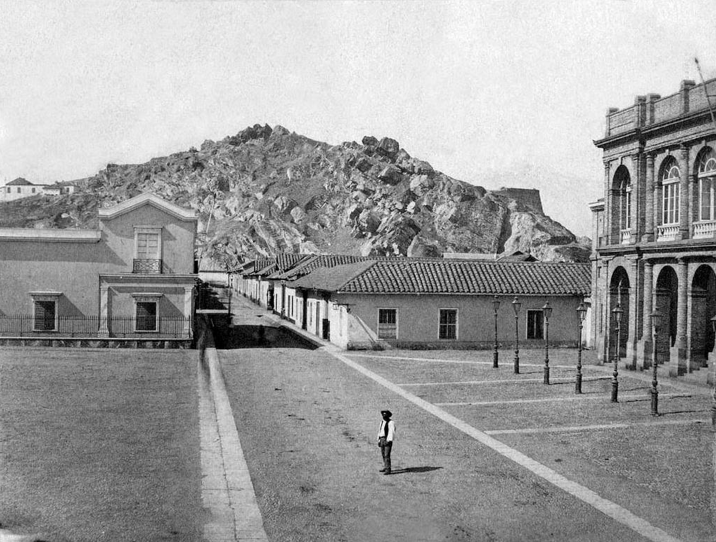 Vista plazuela frente al Teatro Municipal y cerro Santa Lucía de Santiago en 1860. alb0black