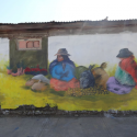 Mural de Sol reciclando muros en el Museo a Cielo Abierto de la Pincoya